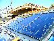Fase di installazione pannelli solari termici a incasso fisso su tetto 